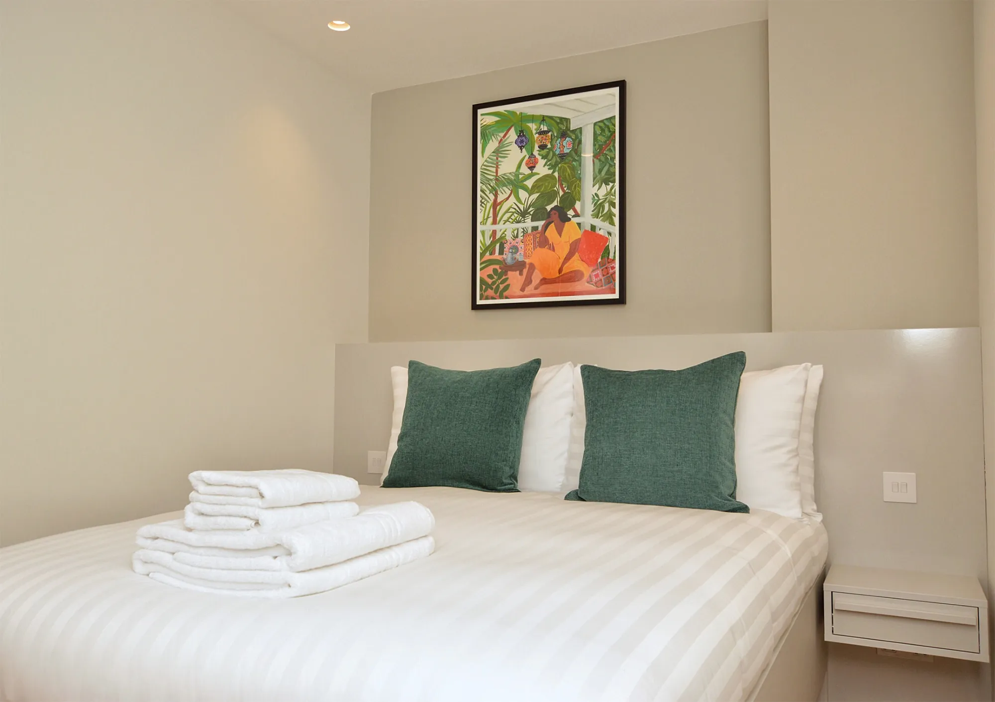 A cozy double bed in an airy one bedroom apartment in Kensington, London