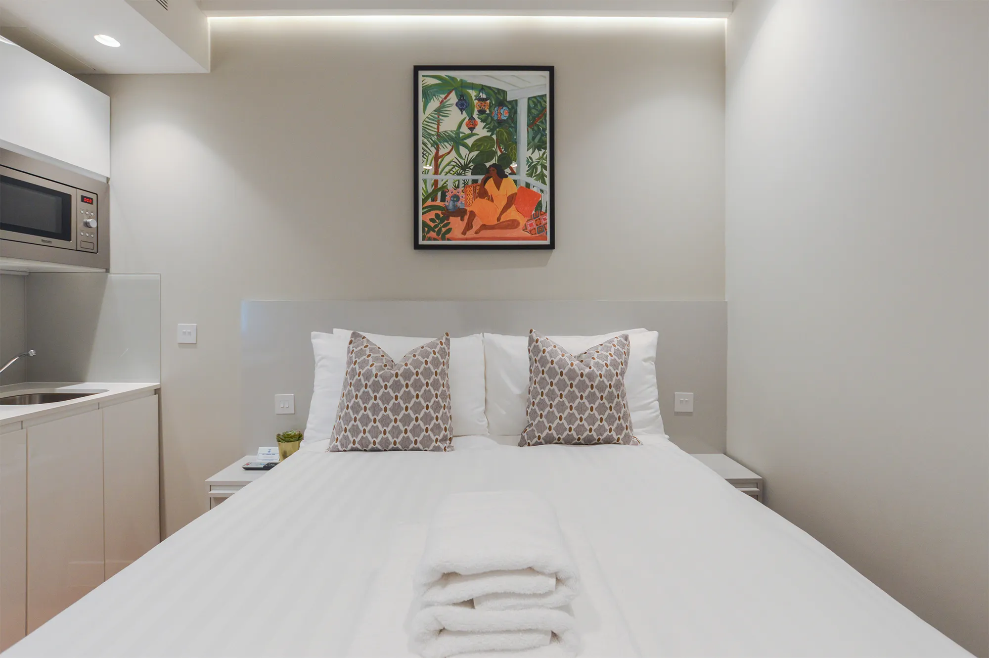 A comfortable double bed in a single-room apartment at 3 Knaresborough Place, South Kensington Apartments, London