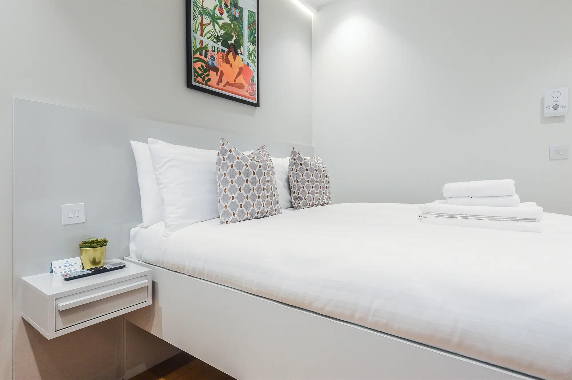 A cozy double bed in a single room apartment at 3 Knaresborough Place, South Kensington Apartments, London