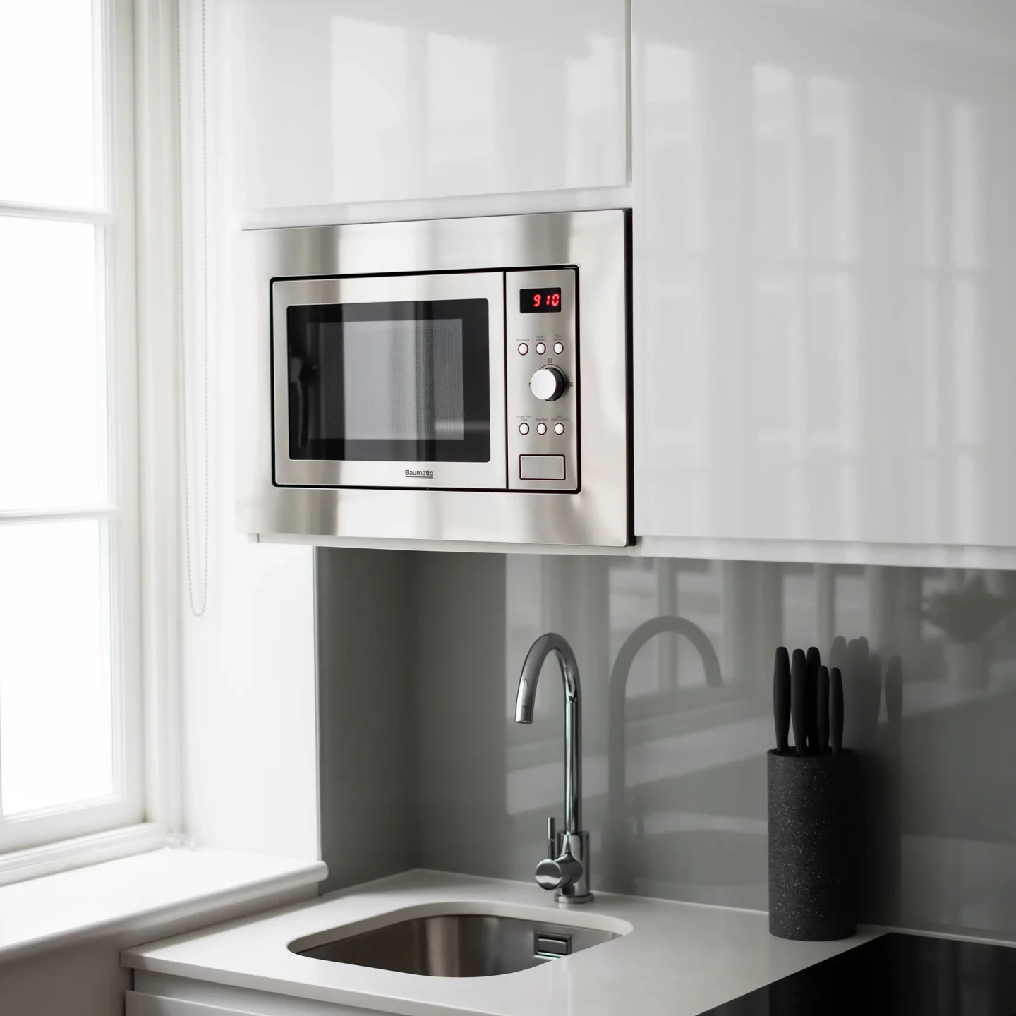 A stylish, fully equipped kitchenette at a Spacpiues Marylebone large studio apartment in 162 New Cavendish, London