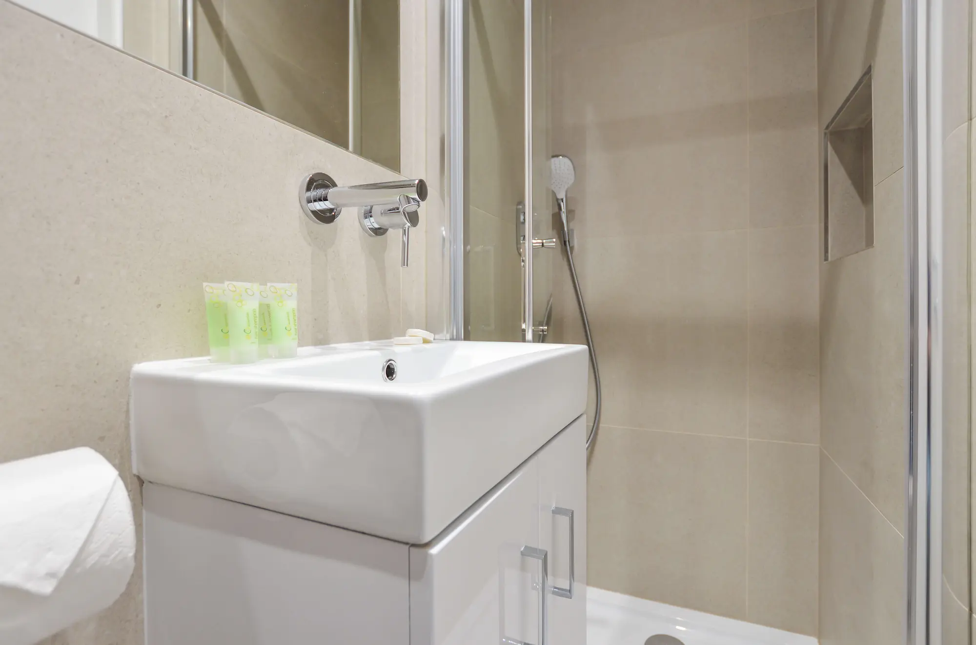 Private bathroom with shower, underfloor heating, and free toiletries in Fitzrovia serviced apartment