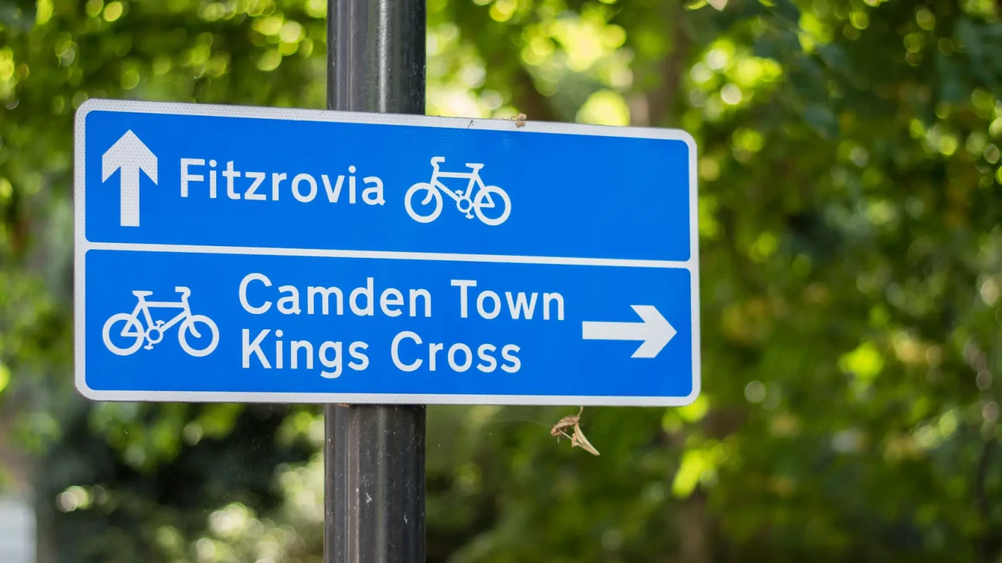 Fitzrovia street sign pointing toward the neighborhood near Fitzrovia Serviced Apartments, close to cafés, restaurants, and hidden gems in central London